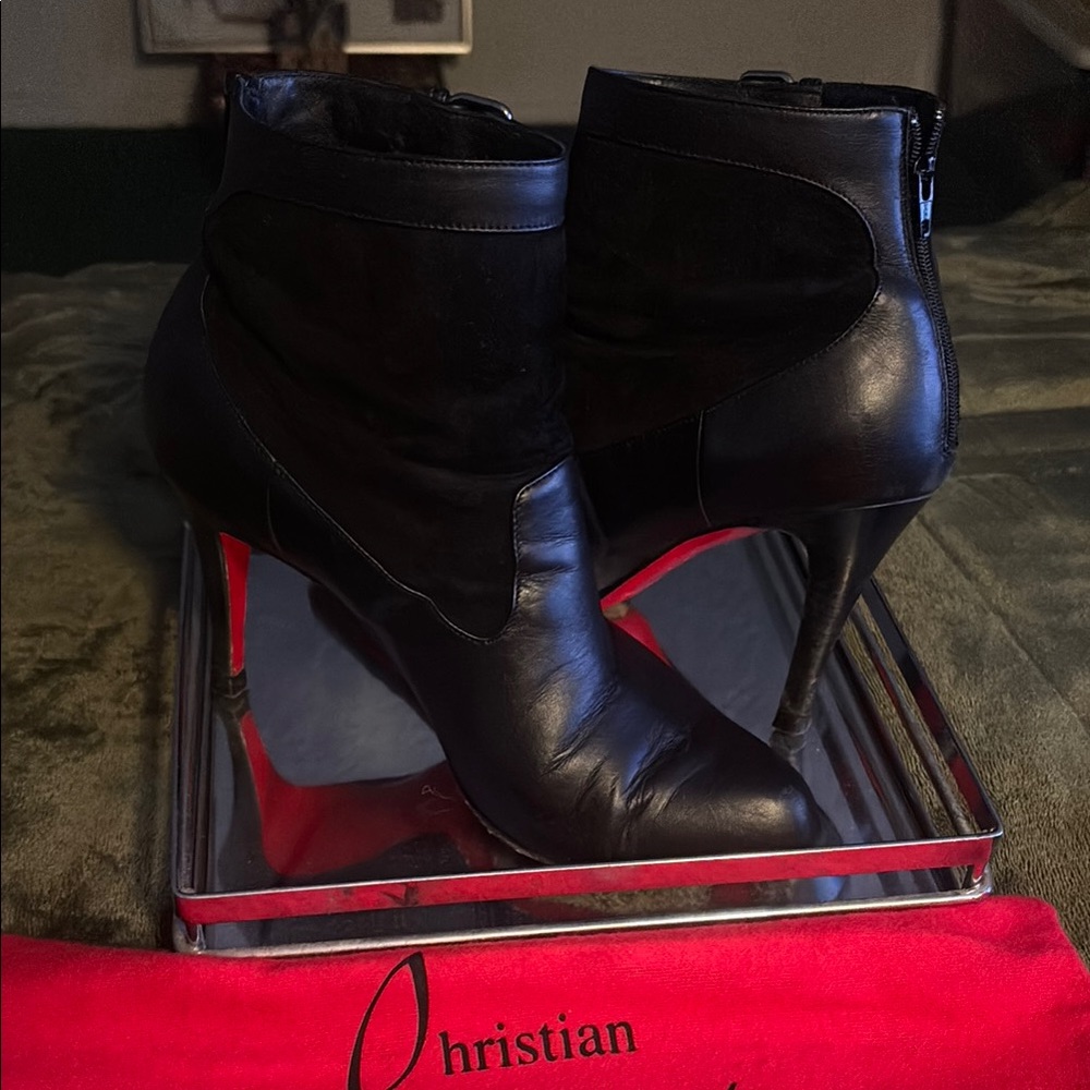 Authentic Christian Louboutin Black and Red Heeled Boots. Super comfortable